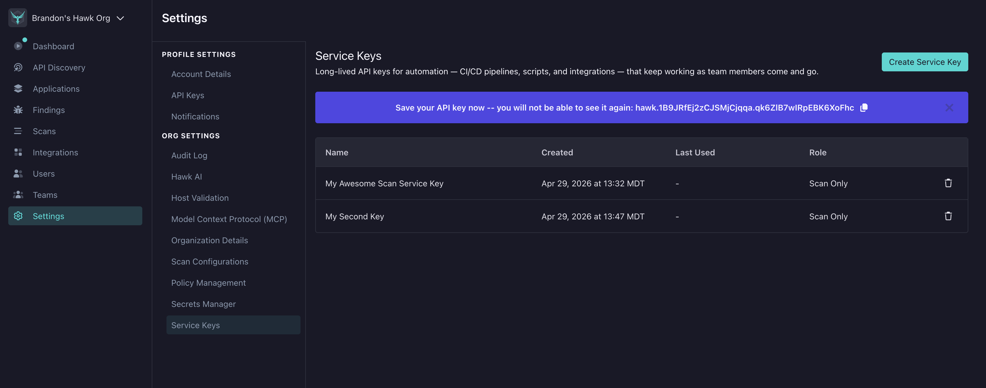 One-time secret reveal banner with the new key value and a copy icon